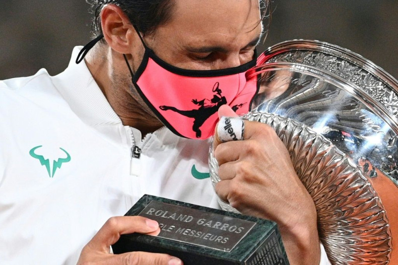Mine again: Rafael Nadal kisses the trophy