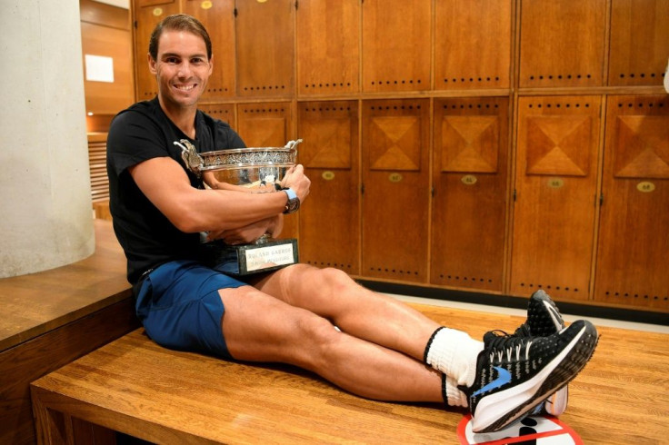 Sitting pretty: Rafael Nadal posing with The Mousquetaires Cup