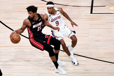 Los Angeles reserve guard Rajon Rondo defends Miami's Jimmy Butler in the Lakers' championship-clinching victory over the Heat in game six of the NBA Finals
