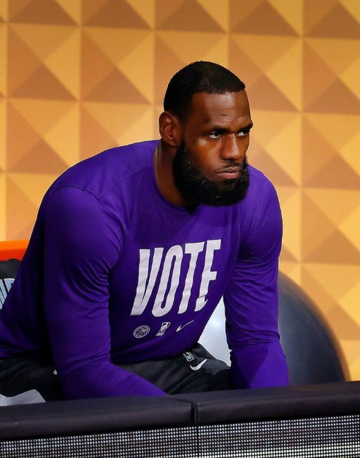 LeBron James of the Los Angeles Lakers wears a VOTE shirt during a pre-game warm-up period in the NBA Finals