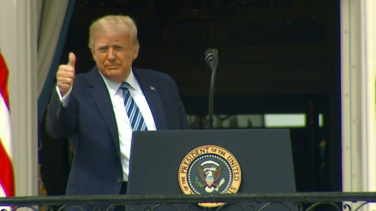 President Donald Trump appears maskless before hundreds of supporters for his first public event since contracting Covid-19, declaring from the White House balcony that the US will defeat what he calls 'the China virus." Trump addresses a cheering crowd o