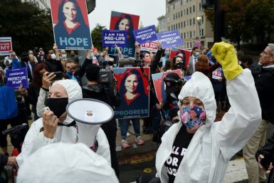 Dueling rallies in support of and against Supreme Court nominee Amy Coney Barrett were held on Capitol Hill on the first day of her confirmation hearings