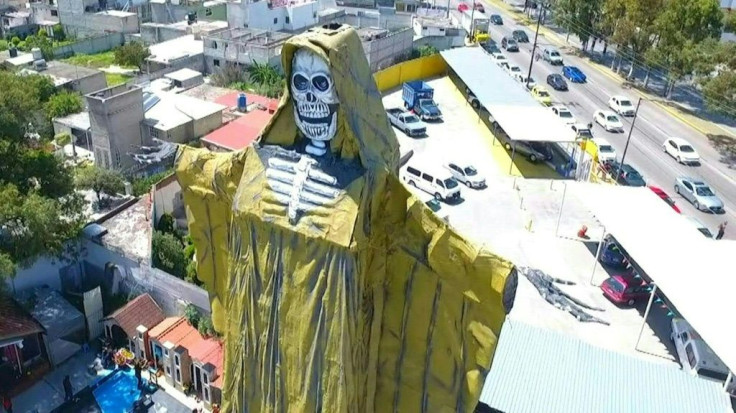 Dozens of followers of Santa Muerte, a Mexican folk saint who personifies death, gather in the outskirts of Mexico City to worship a massive statue of the idol as they take refuge in faith amid pandemic fears.