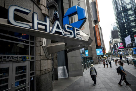 Shares of JPMorgan Chase rose after it reported better-than-expected results and avoided hefty reserves for bad loans