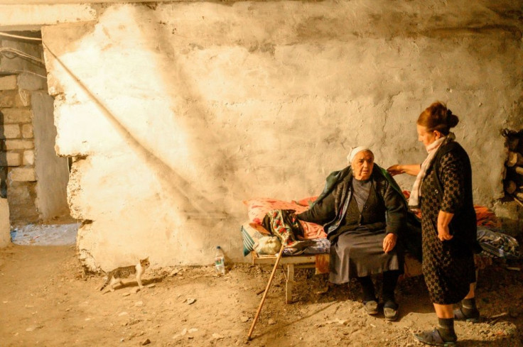 Most of the people sheltering in one sparsely-lit Terter basement are pensioners