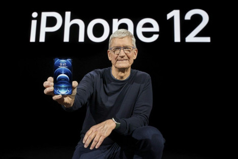 In this photo released by Apple, Apple CEO Tim Cook holds up the all-new iPhone 12 Pro during an Apple event at Apple Park in Cupertino, California on October 13, 2020