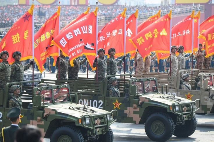 Chinese soldiers participate in a military parade at Tiananmen Square in Beijing in October 2019 as the Asian power rapidly builds its military
