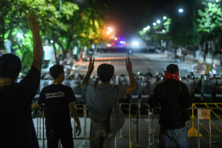 Protesters have adopted the three-fingered salute, a gesture of defiance, from 'The Hunger Games'