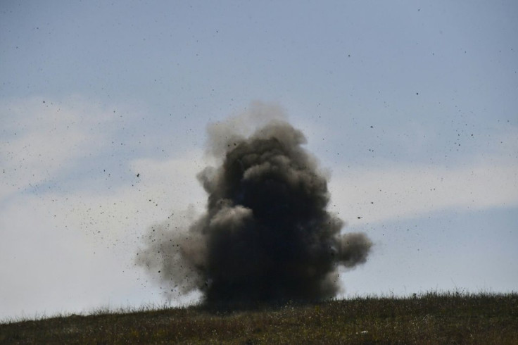 A controlled explosion of unexploded cluster bombs collected by Karabakh sappers