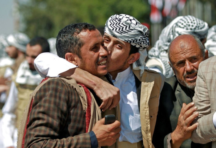 Freed Yemeni Huthi prisoners are greeted by relatives at the airport of Sanaa, after being released as the country began swapping 1,000 prisoners in a complex operation overseen by the International Committee of the Red Cross