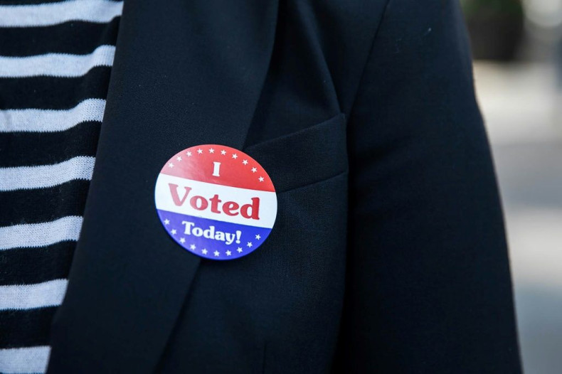 A woman displays an "I Voted Today!" sticker after casting her vote early in Philadelphia, Pennsylvania