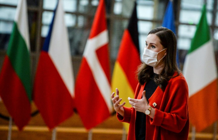 Finland's Prime Minister Sanna Marin left an EU summit on Friday to self-isolate after attending a meeting earlier in the week with a Finnish MP who has since tested positive for Covid-19. She is seen speaking to the media on the summit sidelines.