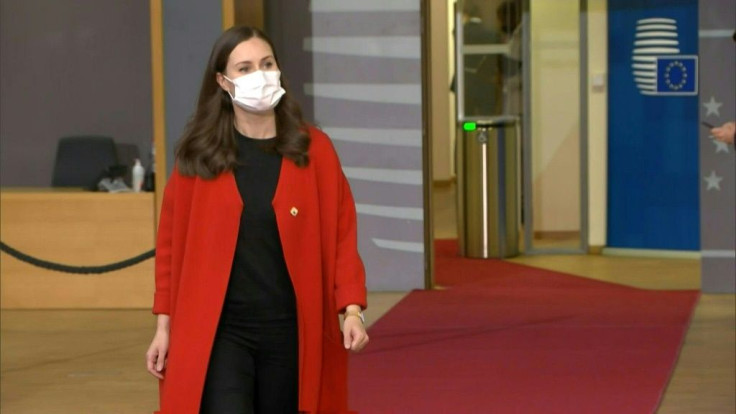 Finnish Prime Minister Sanna Marin arriving at an EU summit before leaving to self-isolate as a precaution after attending a meeting this week with a Finnish MP who has since tested positive for Covid-19, the government said.