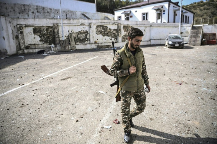 Witnesses said rockets and cluster bombs hit the hospital near the mostly-abandoned northeast village of Martakert late on Wednesday