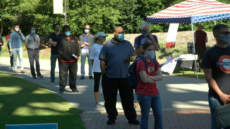 IMAGES AND SOUNDBITESLong lines are forming outside the polling station at North Carolina State University as North Carolinians participate in early voting ahead of November's US presidential election.