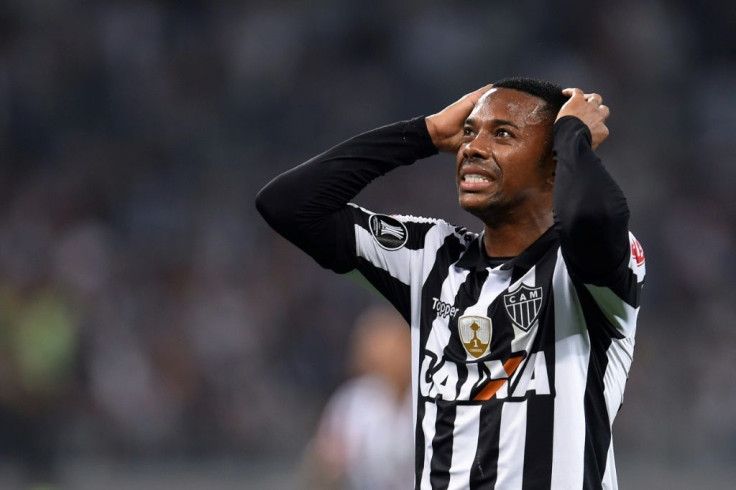Brazilian footballer Robinho has been forced to part ways with his former club Santos amid pressure over his conviction for gang rape by an Italian court, a charge he denies