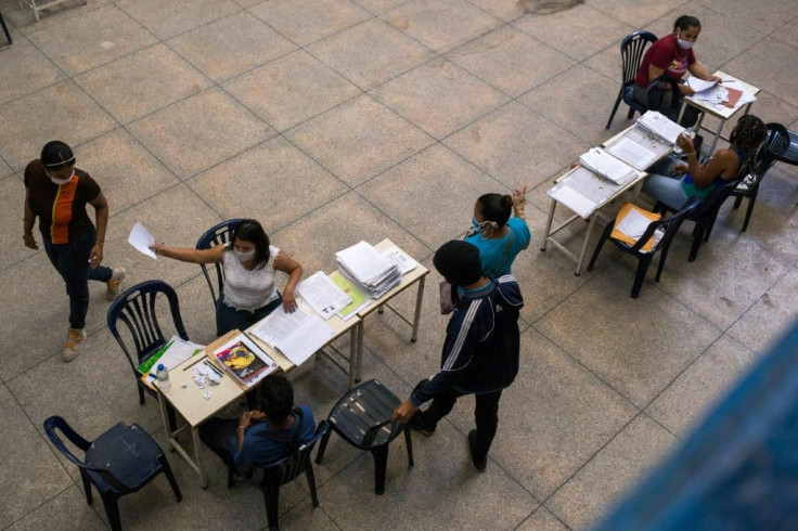 Parents enrolling their children for the 2020-21 school year in the Minas de Baruta district of Caracas, in October 2020