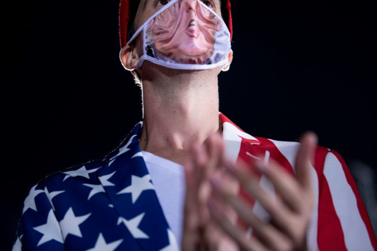 A masked supporter at Donald Trump's rally in Macon, Georgia