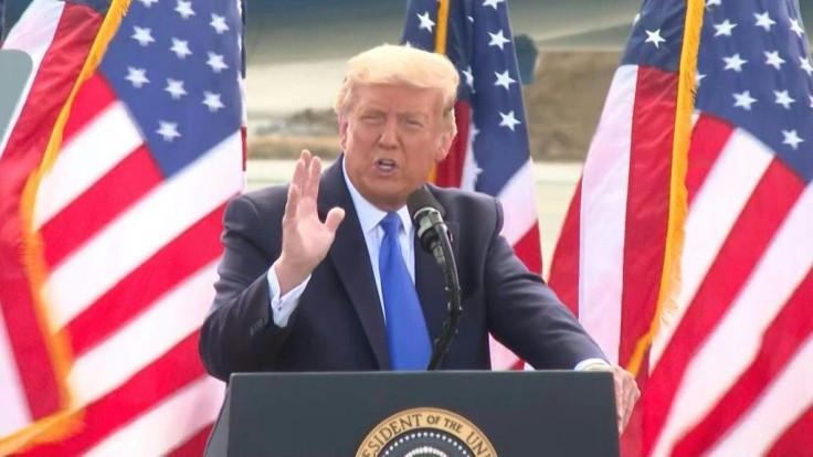 US President Donald Trump holds a rally on the tarmac of Pitt-Greenville airport in the swing state of North Carolina