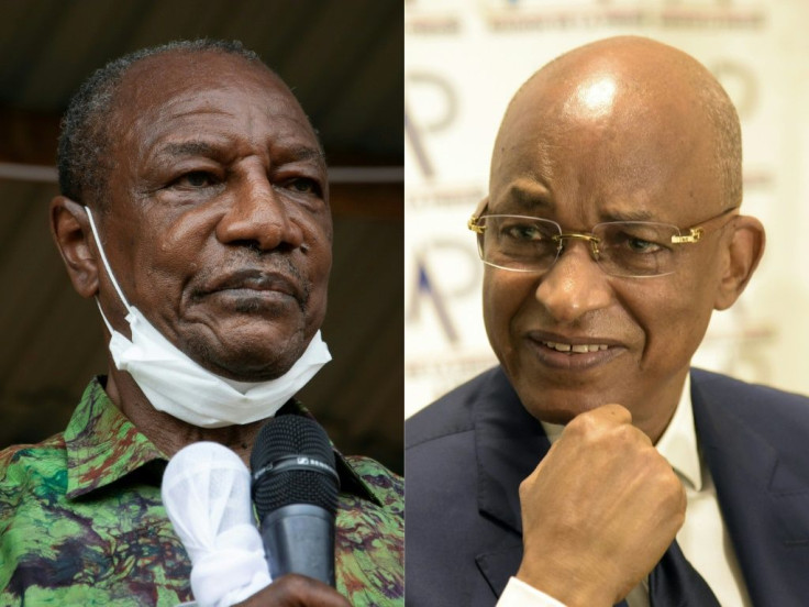 Guinea's President Alpha Conde, left, is seeking to stave off a challenge from his old political opponent Cellou Dalein Diallo