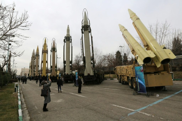 A file photo taken on February 2, 2019, shows Iranians visiting a weaponry and military equipment exhibition in the capital Tehran