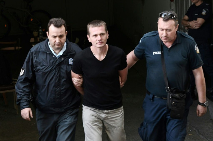 Alexander Vinnik, now about to be tried in Paris for a multi-million euro fraud, arrives at a Greek courthouse in 2017 shortly