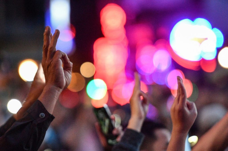 A three-fingered salute taken from "The Hunger Games" book and movie series has become a symbol of the Thai protests