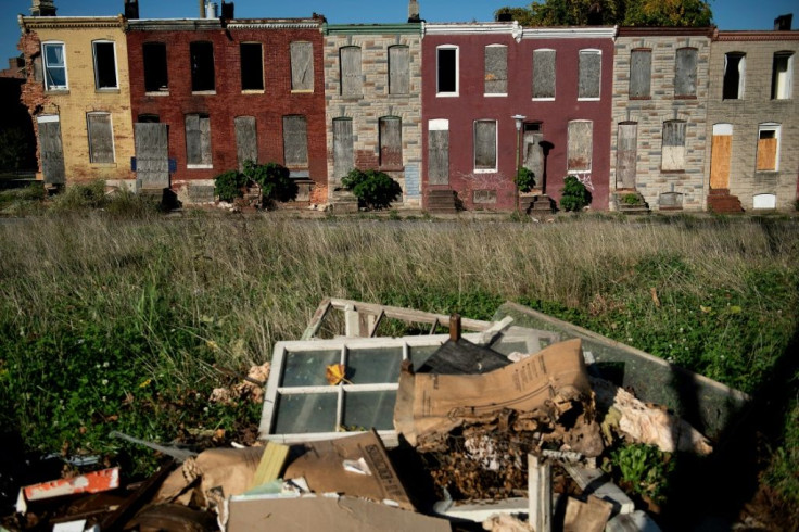 Boarded up rowhouses and piles of trash are common sights in east the poor neighborhoods of east Baltimore