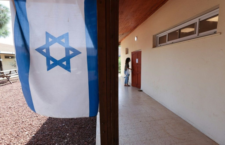 A camp instructor for Israeli teenagers at the main camp building in "Trump Heights", where youth are put through a six-month programme ahead of national service