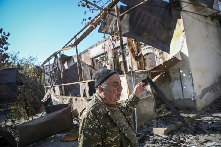 Misha Gyurjyan's two sons are at war, his wife has fled to Armenia's capital Yerevan