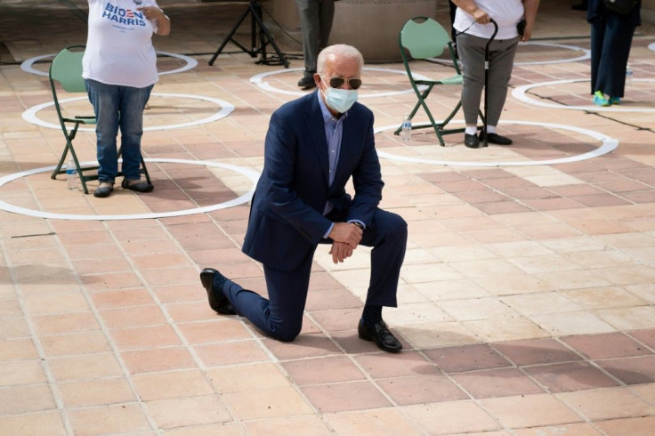 Democratic presidential candidate Joe Biden, posing with supporters in Las Vegas on October 9, 2020, has vowed to renew international cooperation