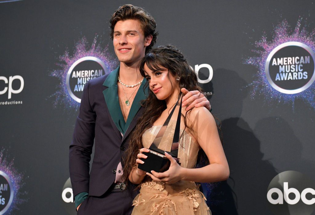Camila Cabello and Austin Kevitch were photographed packing on the PDA duri...