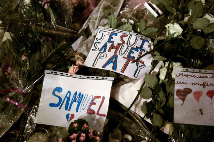 Thousands marched Tuesday in the suburb of Conflans-Sainte-Honorine where murdered teacher Samuel Paty worked