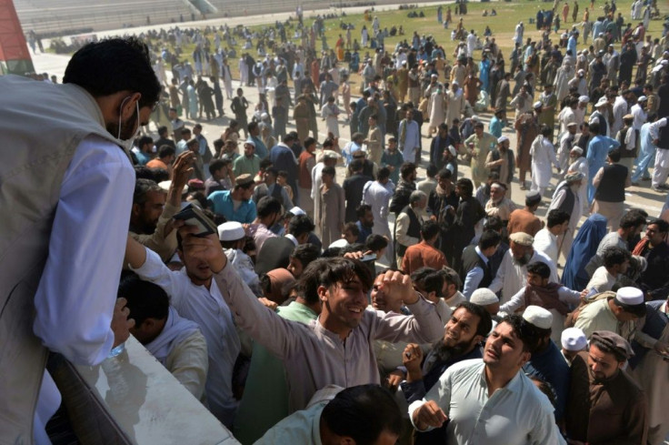 Large crowds gathered in a bid to secure permission to travel to Pakistan