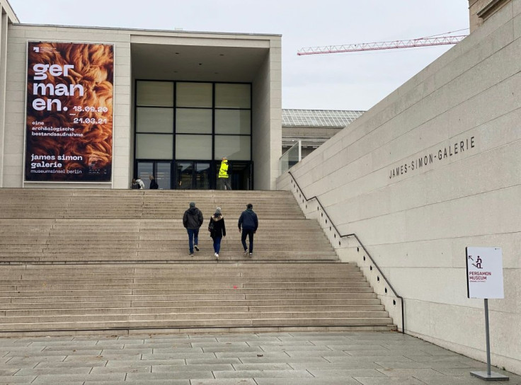 Visitors head Wednesday to the Pergamon Museum, one of several in Berlin where sculptures, paintings and Egyptian sarcophagi were damaged by vandals.