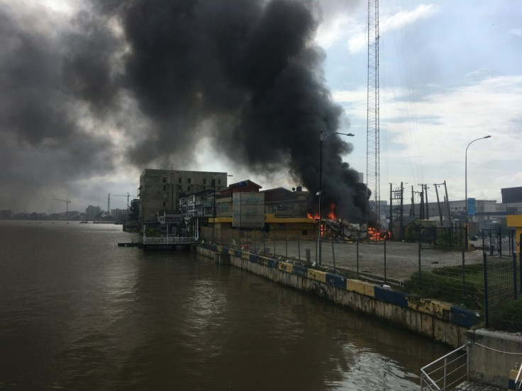A building is ablaze near the Lekki toll gate, epicentre of the Lagos protests