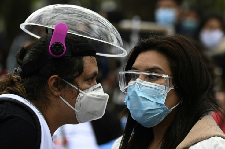 Nurses take part in a demonstration requesting better working conditions in front of city government headquarters in Buenos Aires