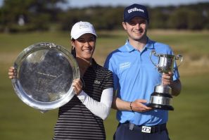 Celine Boutier of France and David Law of Scotland hold their trophies after winning respectively the LPGA Tour and European Tour Vic Open titles in 2019