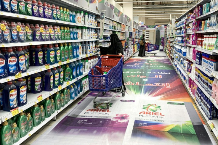 People shop at a supermarket in Riyadh. Multiple Saudi supermarket chains have announced they are stopping the import and sale of Turkish products