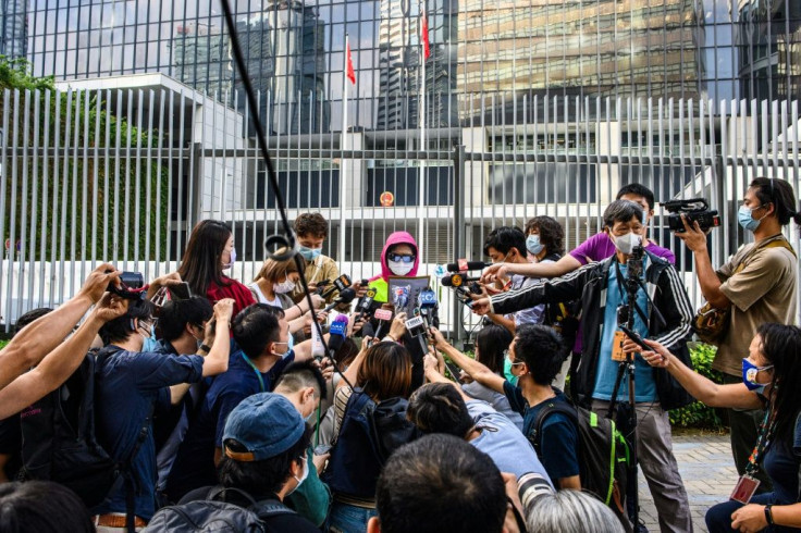 Poon's mother (C) has cut a tragic figure, shuttling between Hong Kong ministries and urging officials to break the legal deadlock on Chan's extradtion to Taiwan
