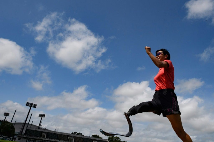 Japanese athlete Sayaka Murakami practices long jump at Matsuyamashita Park in Inzai of Chiba