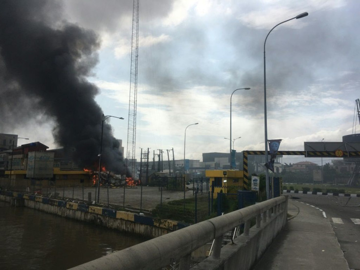 Buildings were torched in Lagos after the shooting