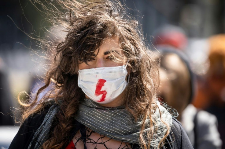 Women demonstrated against the new abortion bill outside the parliament in Warsaw earlier this year