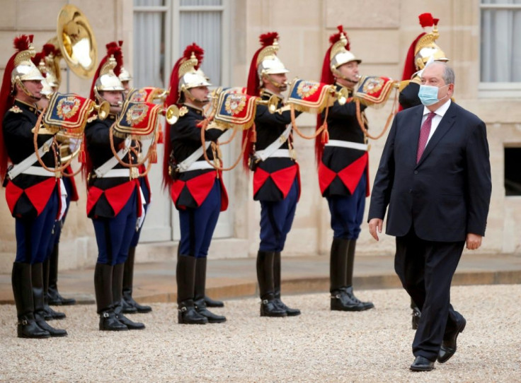 Armenian President Armen Sarkissian arrives for a meeting with the French President at the Elysee Palace in Paris on Thursday