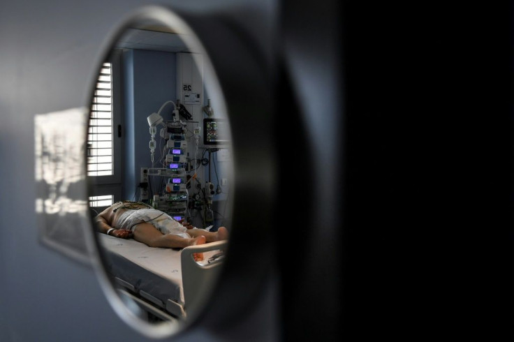 A patient in a coronavirus intensive care unit at the Sao Joao Hospital in Portugal's Porto