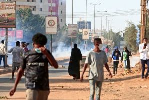 Protesters take to the streets of Khartoum, where officials hope the end of the US designation of Sudan as a state sponsor of terrorism will provide a needed economic boost