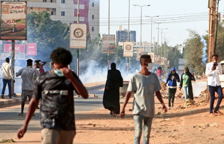 Protesters take to the streets of Khartoum, where officials hope the end of the US designation of Sudan as a state sponsor of terrorism will provide a needed economic boost