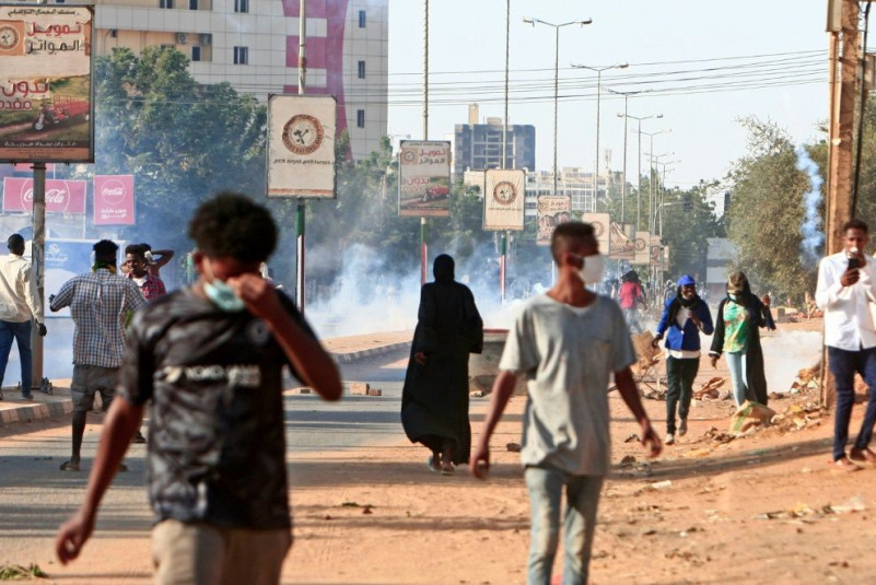 Protesters take to the streets of Khartoum, where officials hope the end of the US designation of Sudan as a state sponsor of terrorism will provide a needed economic boost