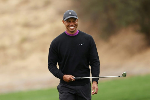 Reigning Masters champion Tiger Woods, who fired a 76 in Thursday's opening round, improved to shoot a six-under 66 in Friday's second round of the US PGA Zozo Championship