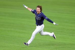 Brett Phillips celebrates after hitting a ninth-inning two-run walkoff single in the Tampa Bay Rays 8-7 victory over the Los Angeles dodgers that evened the World Series at two games apiece